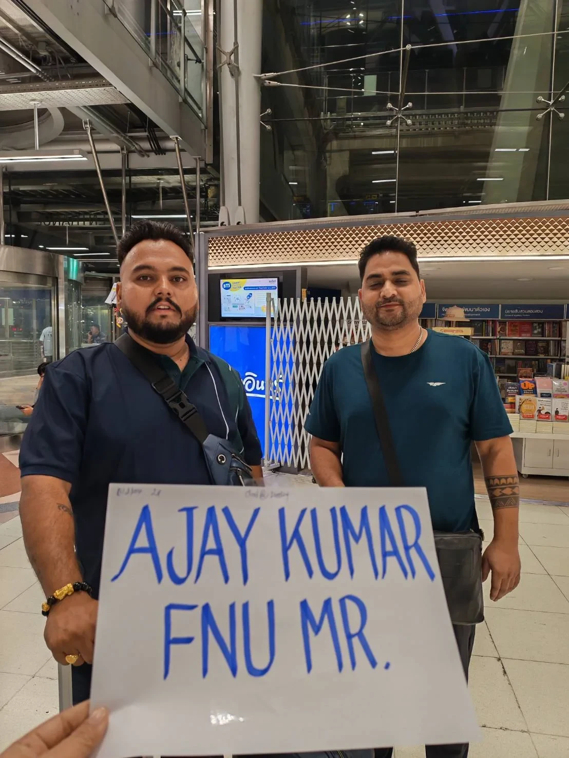 Passengers at the airport meeting point