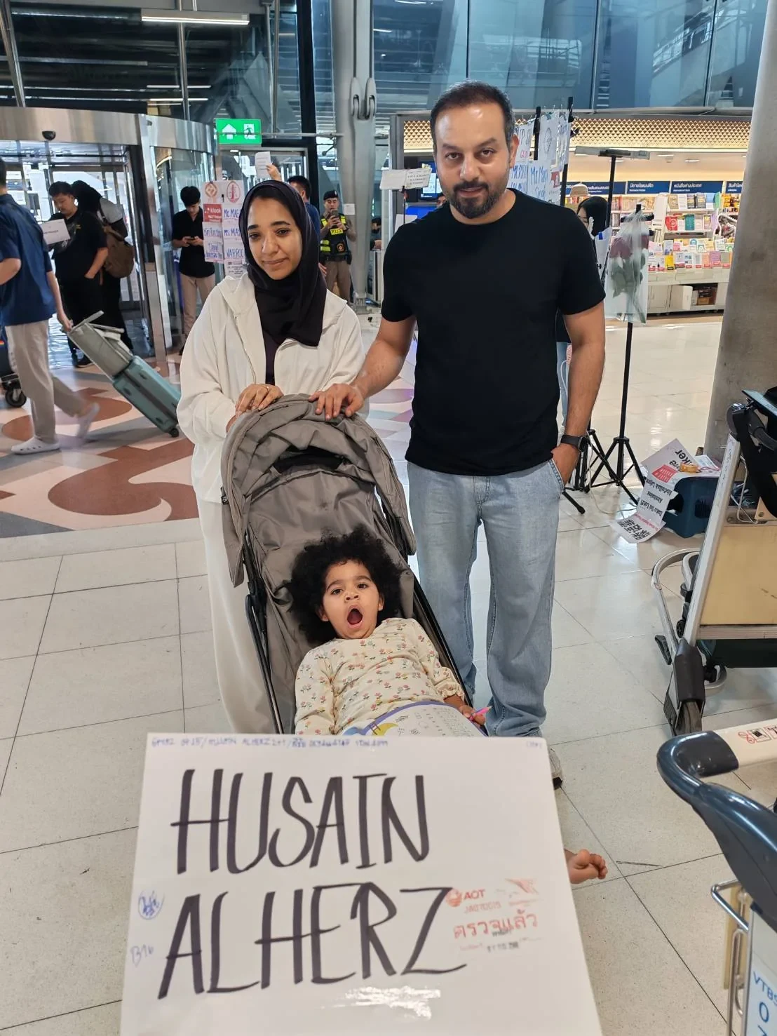 Family pickup with luggage at the airport