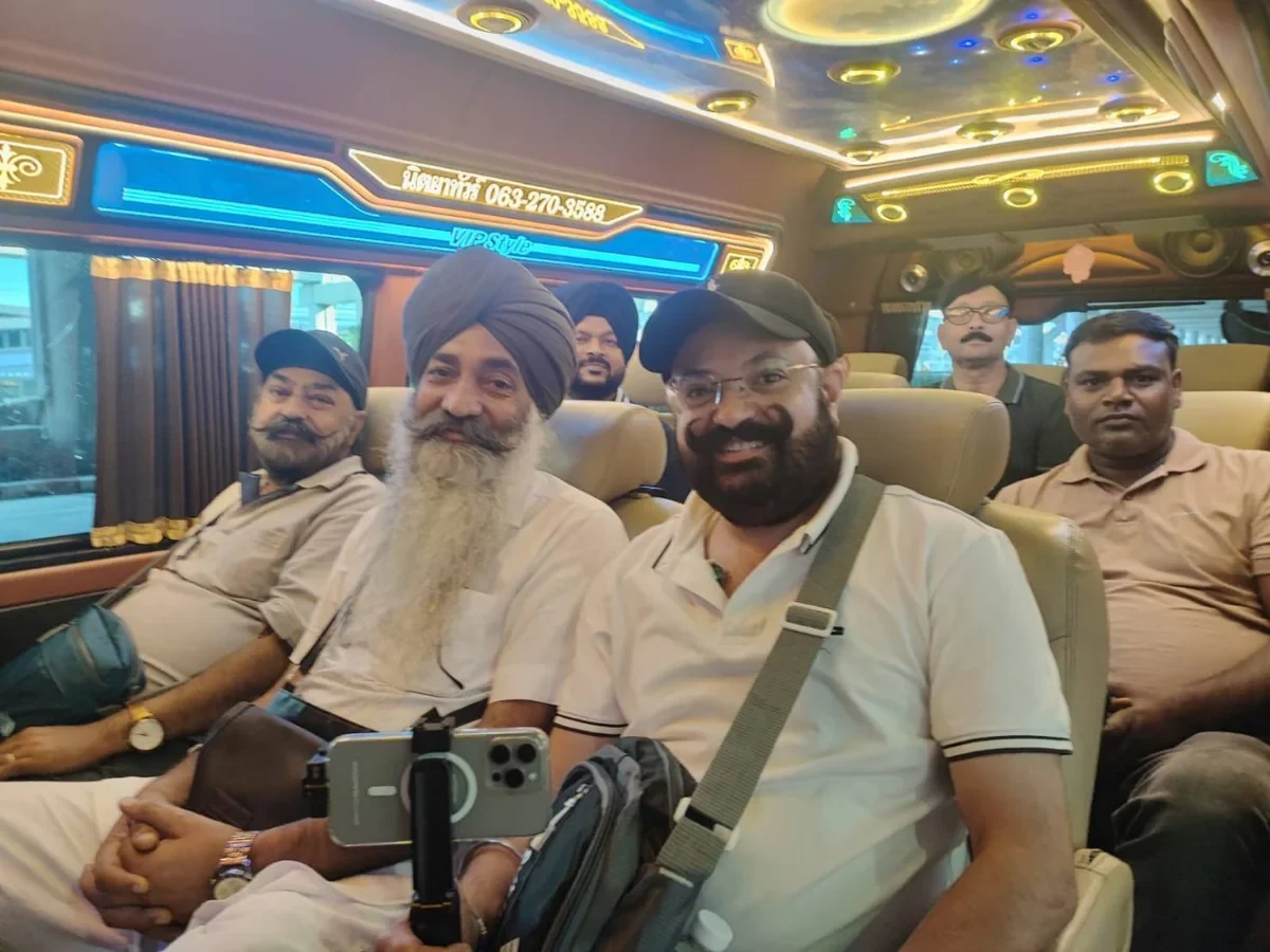 Passengers seated inside a passenger van